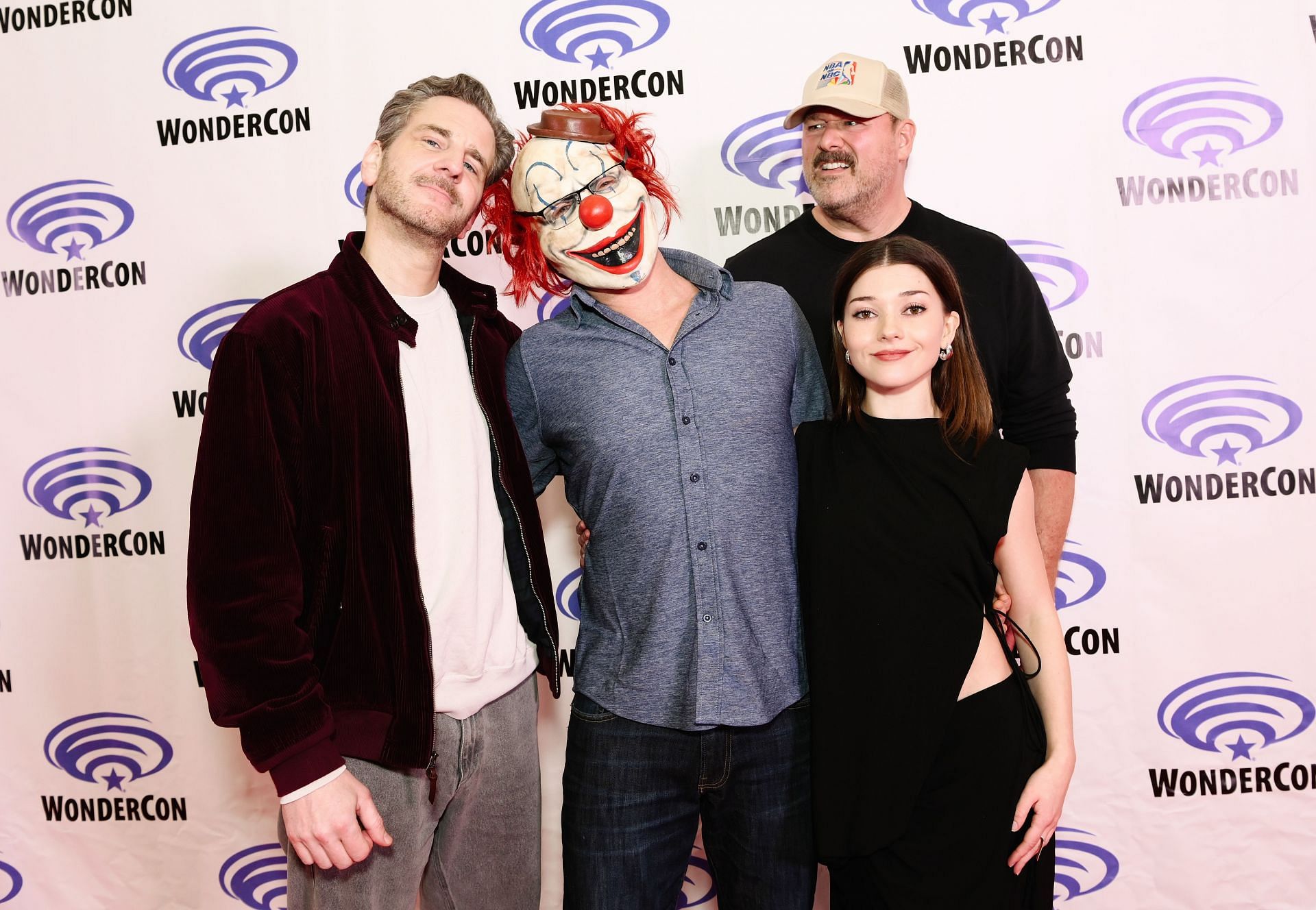 Cast of Clown in a Cornfield with director Eli Craig at WonderCon 2025 (Image via Getty)